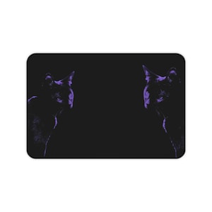 May include: A set of three ceramic mugs with a speckled, matte finish in cream, light grey, and dark grey. Each mug has a simple, minimalist design, ideal for coffee or tea.