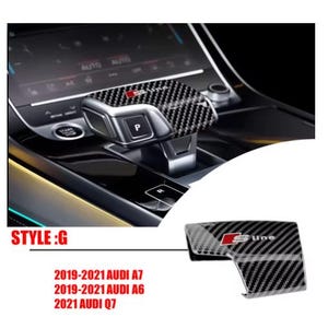 May include: Carbon fiber gear shift cover for Audi A7, A6, and Q7 models. The cover features a black and gray carbon fiber pattern with a red and silver S line logo. Compatible with 2019-2021 Audi A7, A6, and 2021 Audi Q7. Style: G.