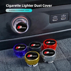 May include: Cigarette lighter dust covers in multiple colors, featuring the S Line logo. The image shows a clear cover installed, with additional covers in blue, black, red, gold, and silver. The text "Available in multiple colors" is also visible.
