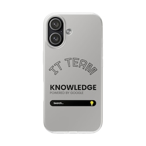 May include: A clear phone case with a dual-lens camera and a silver frame. The case features the text "IT TEAM KNOWLEDGE POWERED BY GOOGLE" in black, along with a search bar and a lightbulb icon.