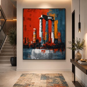Op de afbeelding: Een groot rechthoekig wandkunstwerk met een abstract schilderij van antieke stenen zuilen. De compositie gebruikt gedurfde streken van levendig rood, diepblauw en oranje, met witte accenten die de architecturale ruïnes tonen.