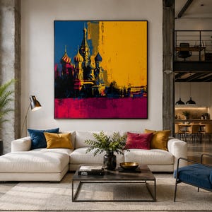 May include: A large square wall art piece featuring a stylized, high-contrast illustration of Saint Basil's Cathedral. The artwork uses a bold color palette of deep blue, vibrant yellow, and magenta, with textured, painterly brushstroke effects.