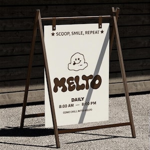 May include: A-frame sign with a white background and brown lettering. The sign reads "SCOOP, SMILE, REPEAT" at the top, and "MELTO" in large letters. Below, it says "DAILY 8:00 AM - 8:00 PM COME CHILL WITH MELTO". The sign has a cartoon ice cream graphic.