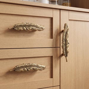 Federförmige Schrankgriffe, Vintage-Schubladengriffe, dekorative Küchenschrankbeschläge, Vogelfeder-Kommodengriffe, elegante Kleiderschrank-Türgriffe