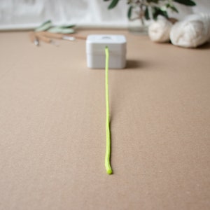 The X-Files Main Title Theme Music Box for mystery and sci-fi fans, extra long neon green pull string, washable, musical movement image 3