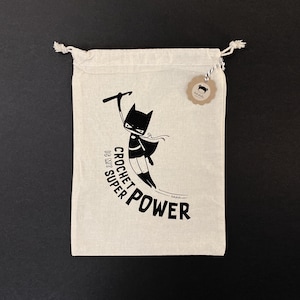 Cotton bag lalylala CROCHET is my SUPERPOWER • BatCat, superhero print, superheroine, sustainable giftwrapping, project bag crochet, knit