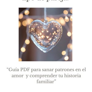 May include: A digital document cover featuring the Spanish text: ¿Por qué repito el mismo tipo de pareja? Guía PDF para sanar patrones en el amor y comprender tu historia familiar. Ani Blanco Constelaciones Familiares. A clear glass heart ornament.