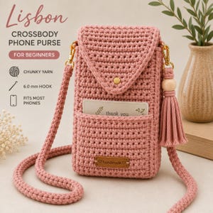 May include: A dusty pink crochet crossbody phone purse featuring a flap with a gold button, a long matching strap, and a side tassel with a wooden bead. A small brown leather-like tag labeled handmade is attached to the front pocket area.
