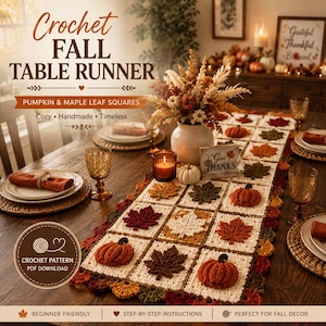 May include: A crochet table runner featuring square motifs with raised pumpkin and maple leaf designs in shades of orange, brown, and cream. The runner has a scalloped border and is displayed on a wooden table with place settings and decor.