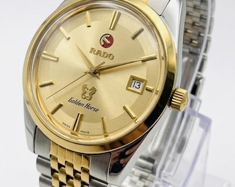 Reloj suizo RADO Golden Horse MOD - automático - calibre ETA 2824-2 - esfera dorada - correa bicolor con textura de grano de arroz - como nuevo