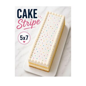 May include: A rectangular cake with white frosting and colorful sprinkles. The cake is decorated with a piped border and sits on a white serving platter. The text "CAKE Stripe" and "5x7" are visible in the image.
