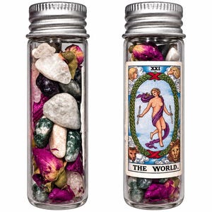 Single pull tarot with herbs, flowers, and crystals