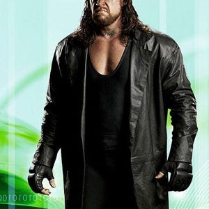 May include: A person wearing a black hat, black leather coat, black gloves, and a black vest. The person has long dark hair and a beard. The background is a gradient of green and blue.