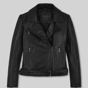 May include: Black leather jacket with a notched collar, asymmetrical zipper closure, and zippered pockets. The jacket features a belt at the waist and the text "LEATHER CULT" on a label inside the collar. A classic outerwear piece.