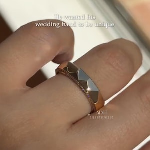 May include: Modern faceted men's wedding band crafted in solid 14K yellow gold featuring a geometric exterior and pavé-set lab diamonds along one side of the band. The text "BY ADITISILVERJEWELUS" is visible at the bottom.