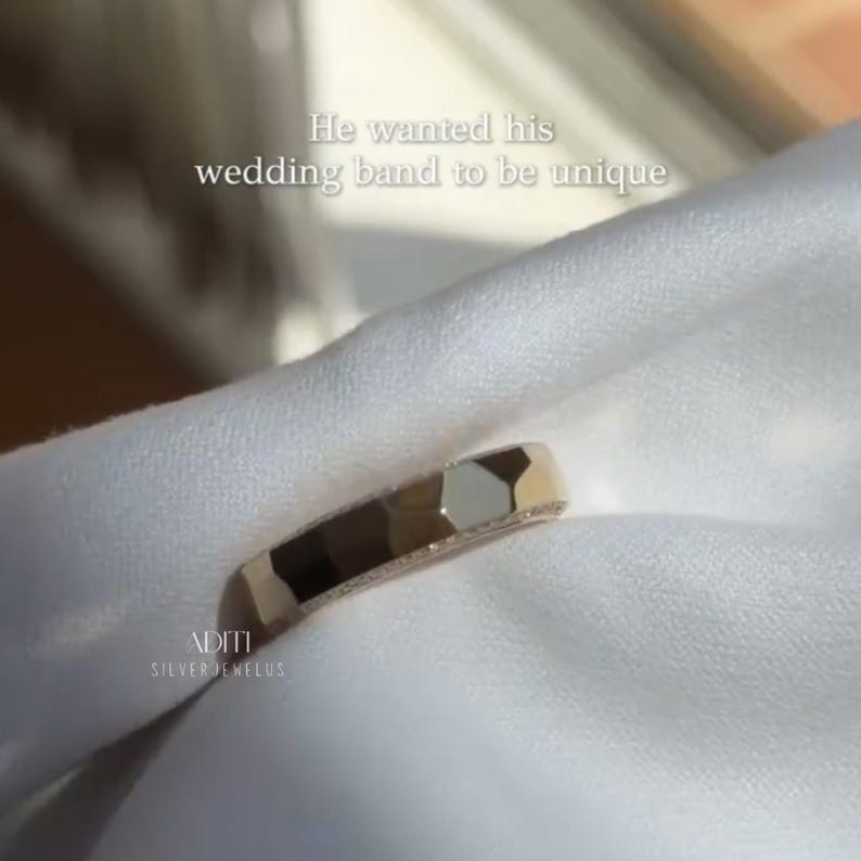 May include: Modern faceted men's wedding band crafted in solid 14K yellow gold featuring a geometric exterior and pavé-set lab diamonds along one side of the band. The text "BY ADITISILVERJEWELUS" is visible at the bottom.