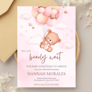 May include: Baby shower invitation with a watercolor design. A teddy bear is floating with balloons. The text reads "We can bearly wait for Baby Jonathan to arrive" and includes the name Hannah Morales.