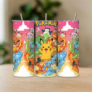 May include: Three stainless steel tumblers with a pink background and a colourful Pokemon design. The design includes Pikachu, Charmander, Squirtle, Bulbasaur, and other characters. Each tumbler has a silver straw.
