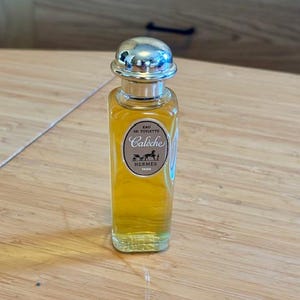 May include: A rustic wooden sign with the text "Welcome to our home" in white lettering. The sign features a distressed finish and a simple, inviting design, perfect for a front porch or entryway.