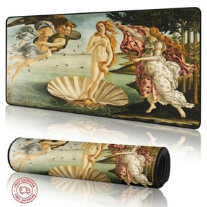 May include: A rectangular mouse pad featuring a print of Sandro Botticelli's "The Birth of Venus." The artwork depicts Venus standing on a seashell, with figures of angels and a woman in a floral dress. The pad is black with a rolled-up version below.