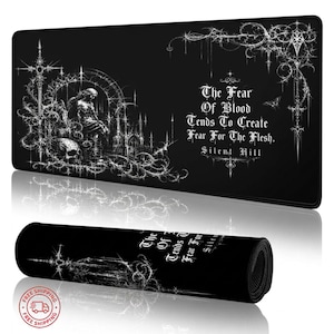 May include: Black rectangular mouse pad with a gothic design. The pad features a detailed white illustration of a gothic scene with a skull, a seated figure, and architectural elements. Text reads "The Fear Of Blood Tends To Create Fear For The Flesh. Silent Hill."