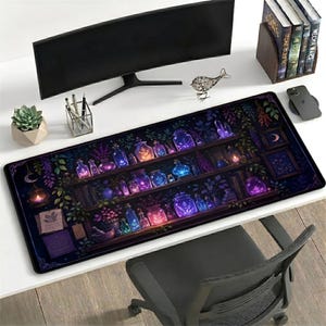 May include: A large, rectangular desk mat featuring a colorful illustration of a potion shelf with glowing jars and bottles. The mat has a black border and is placed on a white desk, with a computer monitor and other desk accessories.