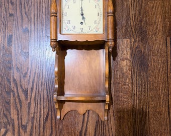 Vintage Trend wall clock w/wooden case and shelf. Green & pink floral roman numeral face. Made in Zeeland, Michigan, USA-Not Electric-No Key