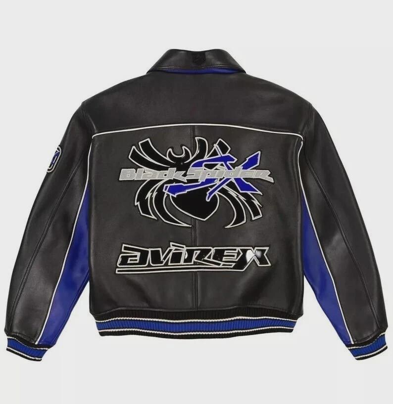 May include: A black leather varsity jacket featuring blue side panels and a ribbed hem with blue and white stripes. The back displays a large graphic of a black spider with the text Black Spider and the brand name Avirex in white and blue.