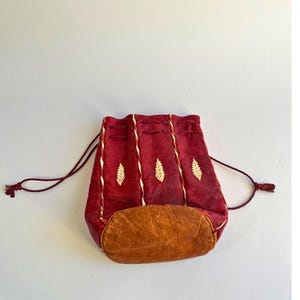 Vintage Navajo Leather Purse  with Drawstring Top and Feather Details