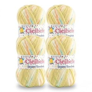 May include: Six skeins of yellow yarn with colorful flecks of orange, blue, and white. Each skein is wrapped with a label that reads "Cici Bebe" and "Deseni Kendinden". The yarn is likely for knitting or crocheting.