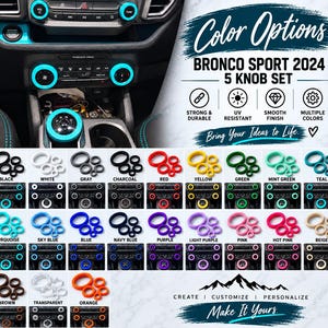 May include: A 5-knob set for a 2024 Bronco Sport, featuring circular covers in various colors including black, white, red, blue, and orange. The image displays the knobs installed on a vehicle dashboard and shows a color chart with labels.