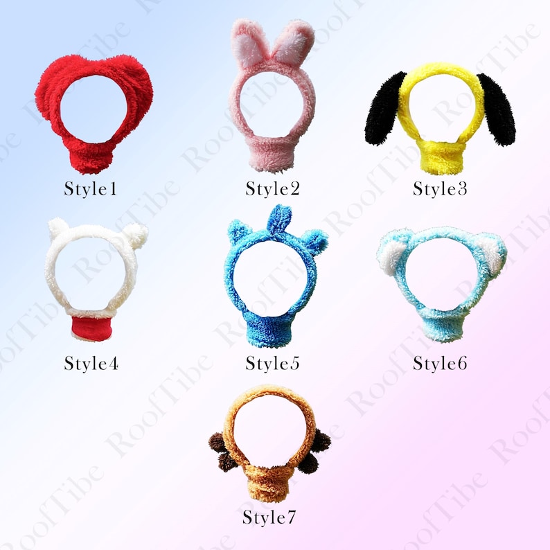 May include: A collection of seven plush headbands in various animal and character designs. Styles include a red heart, pink bunny ears, a yellow dog, a white bear, blue horns, a blue bear, and a brown deer.