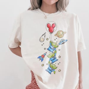 Comfort Colors Pizza Planet Shirt, Toy Story Aliens Tee, Disney Pixar Fest Shirt 2026, Disneyland Pizza Planet Trip Tee, Disney Family Tee