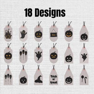 May include: A collection of 18 light gray rectangular and pointed gift tags featuring black Halloween-themed graphics including ghosts, pumpkins, balloons, a witch hat, and text reading Boo and Trick or treat, each with a black string attached.