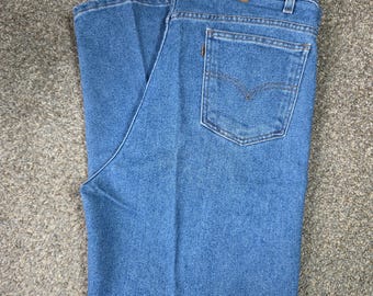 Jeansy męskie Vintage Levis 540 Relaxed Fit Flex w kolorze niebieskim, rozmiar 40x29, kolor pomarańczowy, lata 90.