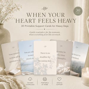 May include: A set of 30 printable support cards titled When Your Heart Feels Heavy, featuring gentle reminders for difficult moments. The cards display soft, neutral-toned imagery, including landscapes and interiors, with text and small leaf icons.