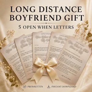 May include: A set of five beige paper letters with the text "LONG DISTANCE BOYFRIEND GIFT" and "5 OPEN WHEN LETTERS" at the top. Each letter features "OPEN WHEN" headings and printed messages, accented by a cream satin ribbon bow and dried flowers.