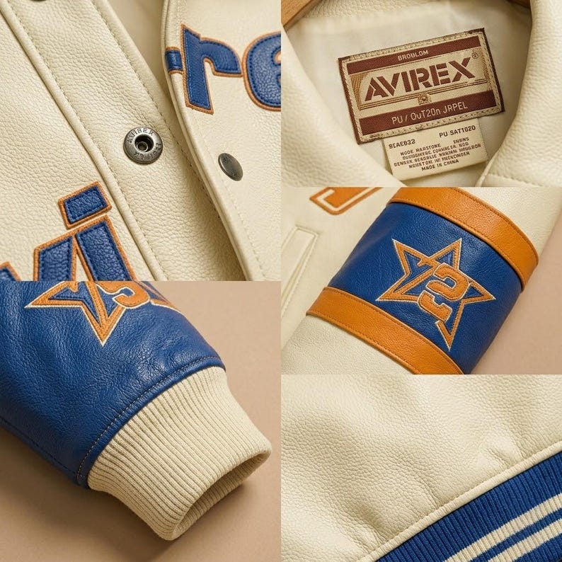 May include: An off-white varsity jacket featuring blue and orange leather accents, ribbed cuffs, and snap buttons. The interior label reads Avirex with additional product details. The sleeves display blue and orange star-shaped patches with the number 2.