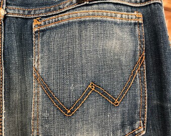 Ladies Vintage Wranglers 1980s 30/32. Orange pocket stiching