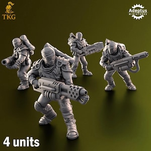 May include: Four gray miniature figures of futuristic soldiers, each armed with a large weapon. The figures are in various action poses, with the text "4 units" at the bottom. The logo for "Adeptus Miniatures" is in the upper right corner.