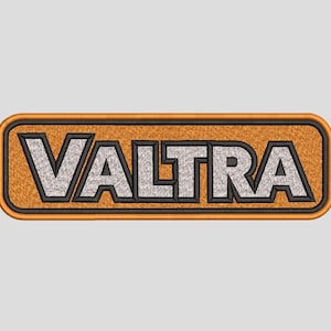 以下が含まれることがあります： 黒い輪郭線で縁取られた銀灰色の太い大文字で「VALTRA」という単語が刺繍された長方形のワッペン。ワッペンの背景は質感のあるオレンジ色の生地で、デザイン全体が厚いオレンジ色のフレームで囲まれています。