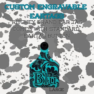 May include: A turquoise and black Ritchey brand ear tag with floral design and the word "Blu". The tag is labeled "LARGE" and includes the text "CUSTOM ENGRAVABLE EARTAGS" and "COMES WITH STANDARD EARTAG BUTTON".