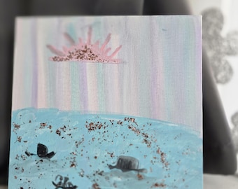 Ekspresyjny obraz 8-letniego artysty przedstawiający zachód słońca nad morzem z żółwiami