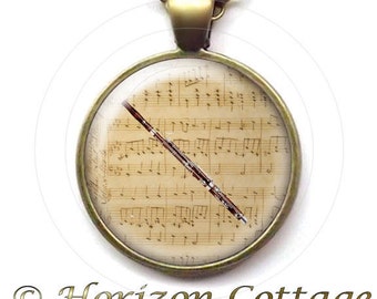 Bassoon Over Handwritten Classical Sheet Music, Gift for Bassoonist, Orchestra Gift, Bassoon Player Gift, Musical Pendant or Book Bag Clip