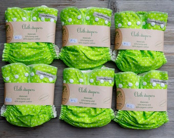 6 katoenen hennepluiers met print + 1 merinowollen luierhoes gratis M-L-maat