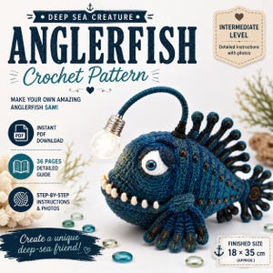 May include: A crochet pattern for an anglerfish named Sam, featuring text that reads DEEP SEA CREATURE ANGLERFISH Crochet Pattern, INTERMEDIATE LEVEL, and FINISHED SIZE 18 x 35 cm. The image shows a dark blue crocheted anglerfish with a light bulb lure.