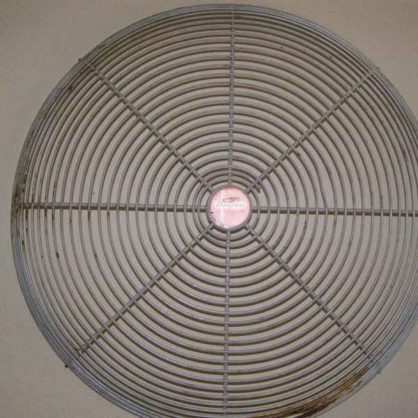 Extra Large Late 1940s Vintage Fan Cover with Red Dayton Logo. Approximately 25 inches diameter. Industrial. Wall hanging.