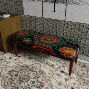 May include: A rectangular bench with four dark brown wooden legs and a cushioned seat upholstered in a vibrant fabric featuring a repeating hexagonal pattern of red, orange, yellow, and teal floral motifs against a dark blue background.