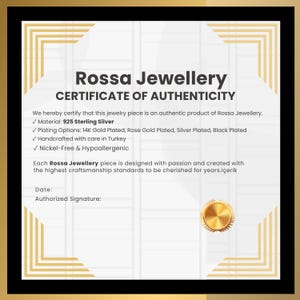May include: A certificate of authenticity from Rossa Jewellery, featuring a gold seal and text. The certificate states the jewelry is made of 925 sterling silver, with plating options including 14K gold and rose gold. It is handcrafted in Turkey.
