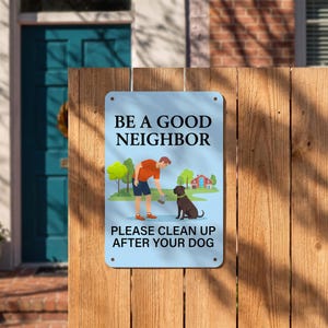 May include: A rectangular light blue metal sign with rounded corners and four mounting holes. The text reads BE A GOOD NEIGHBOR and PLEASE CLEAN UP AFTER YOUR DOG. An illustration shows a person picking up after a black dog in a park.